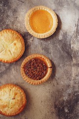 Different various types of mini pies background