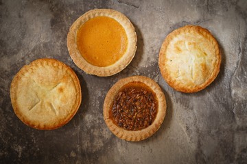 Different various types of mini pies background