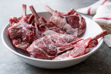 Raw Frozen Bloody Lamb Chops Meat in Plate