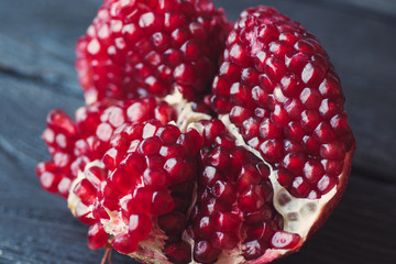 Delicious pomegranate grains close-up. Organic food.