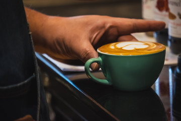 barista make coffee latte art