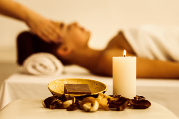 Spa set with aroma candle and soap on foreground