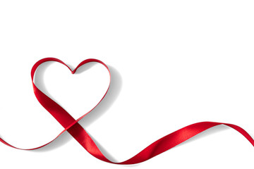 Heart shaped red ribbon for Valentine's day celebration on an isolated white  background