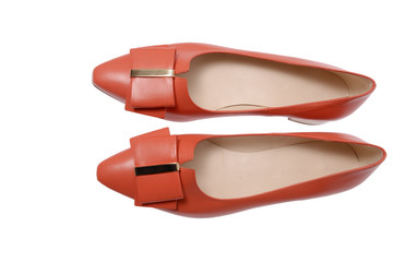 coral shoes with bows top view.
