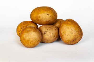 White ecological and very tasty raw potatoes for dishes and cuisine
