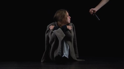 Addicted woman suffering withdrawal symptoms rejecting bottle of beer, suffering