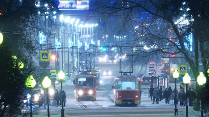 Tram traffic during winter on Lenin Ave in city of  Yekaterinburg, Russia. 4K UHD Timelapse.