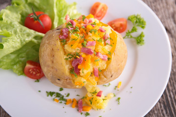 baked potato and ham and cheese