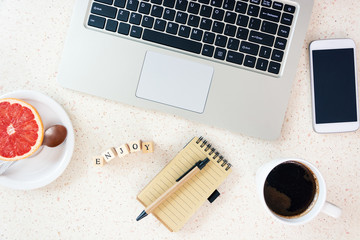 red grapefruit mug of coffee smartphone