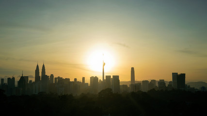 Silhouette of Kuala Lumpur city during Sunrise
