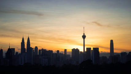 Silhouette of Kuala Lumpur city during Sunrise