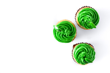 St. Patrick's Day cupcakes isolated on white background. Top view. Copyspace