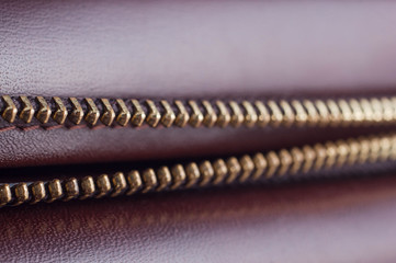 zipper on a leather bag