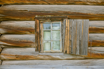 Obraz na płótnie Canvas Window in wooden houses near the Lake Baikal in Siberia in Russia