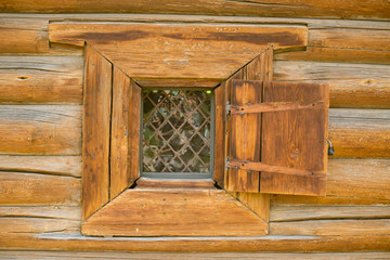 Window in wooden houses near the Lake Baikal in Siberia in Russia