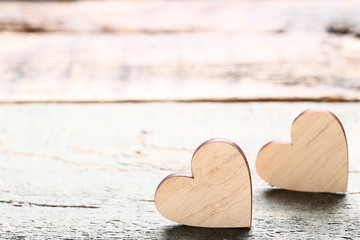 Brown hearts on grey wooden table