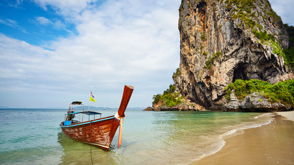 Plakat Long tail boat at a tropical beach, Thailand.