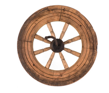 old wooden wheel on a white background