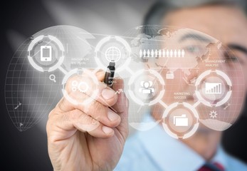 Businessman with digital icons on background