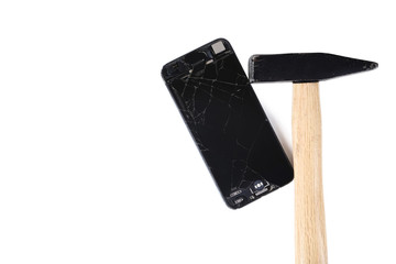 Broken smartphone with hammer isolated on white background