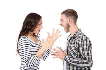 Young couple arguing on white background
