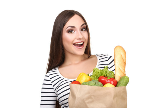 Beautiful Woman Holding Grocery Shopping Bag On White Background