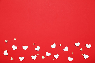 White valentine hearts on red background