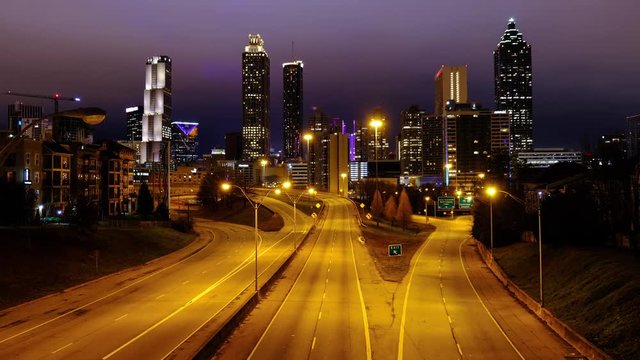 Time lapse video of car traffic moving in downtown Atlanta at night. Georgia, USA