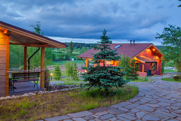 Two houses. Cottage surrounded by greenery. Houses for rent. Buy a cottage. Cottage village. Countryside. Houses in Northwest USA. Buying a property.