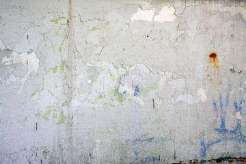 Old concrete wall with rust and cracks