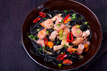 Black spaghetti with cuttlefish ink and seafood