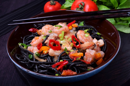 Black spaghetti with cuttlefish ink and seafood