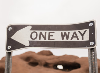 One Way Sign whimsical Phoenix Arizona, USA travel pic with Papago Park in background.
