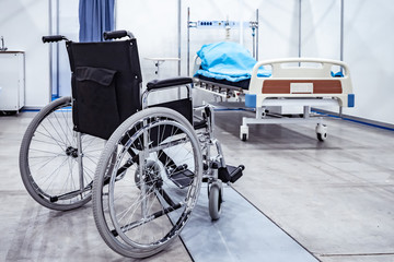 Wheelchair. Medical bed. Disease resulting in disability. Hospital. Hospital bed on wheels....