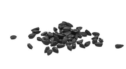 black cumin seeds macro isolated on white background