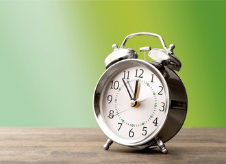 Retro alarm clock on   background
