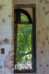 old wooden door in stone wall