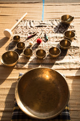 set of tibetan and bowls. Forged singing bowls from Nepal group of objects. set of tibetan and bowls. Forged bowls from Nepal group of objects. Sound therapy.