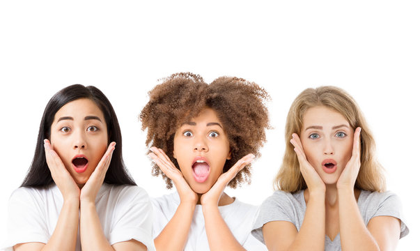 Collage of surprised shocked excited asian, afro american and caucasian women faces isolated on white background. Beautiful young girls set. Copy space