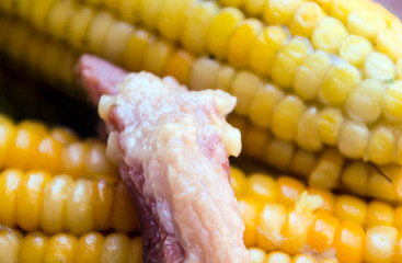 Maize cob potatoes and ribs