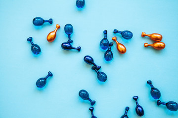 Many pills or capsules with hyaluronic acid and q10 or coenzyme. Caring for skin health.