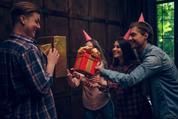 Amazing frinds celebrate birthday and give presents to their friend.