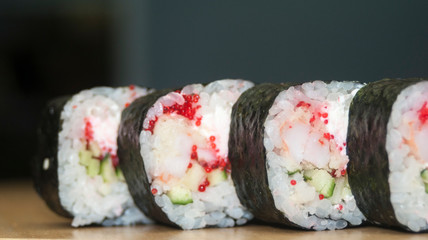 Overhead japanese sushi food. Maki ands rolls with tuna, salmon, shrimp, crab and avocado. Top view of assorted sushi, all you can eat menu. Rainbow sushi roll, uramaki, hosomaki and nigiri.
