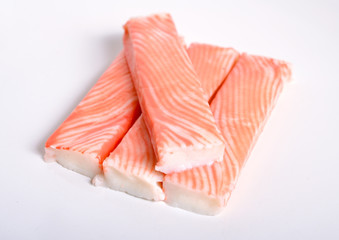 Crab sticks, krab sticks, imitation crab meat or seafood sticks. Isolated on white. © spline_x