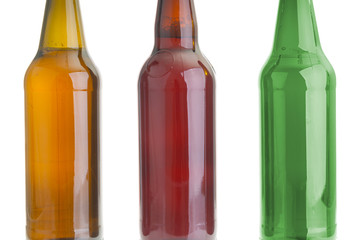 Three beer bottles close up isolated on white background