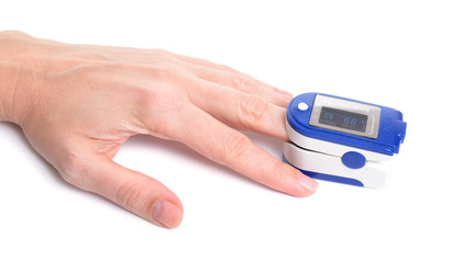 Pulse oximeter with hand of patient isolated on white background