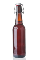 Beer bottle close up isolated on white background