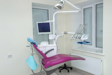 Patient's chair in dentistry with tools and equipment
