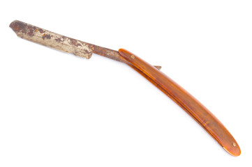 Grunge straight razor isolated on white background