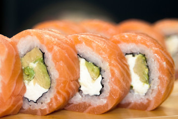 Overhead japanese sushi food. Maki ands rolls with tuna, salmon, shrimp, crab and avocado. Top view of assorted sushi, all you can eat menu. Rainbow sushi roll, uramaki, hosomaki and nigiri.